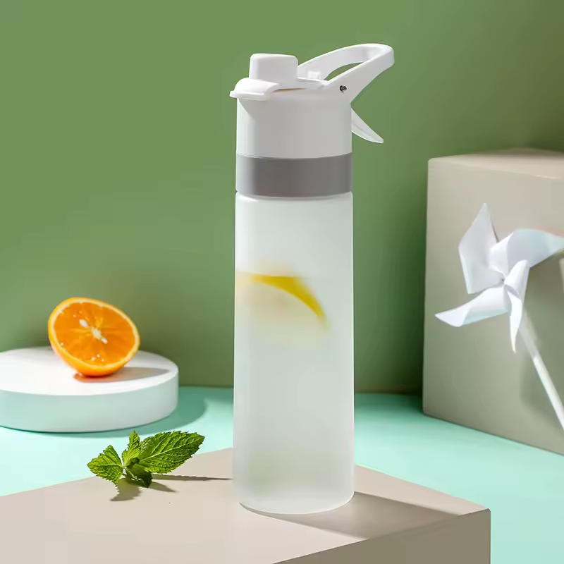 700ml BPA Free Spray Water Bottle for Sports and Travel